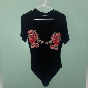 Black floral embroidered bodysuit with cutout
